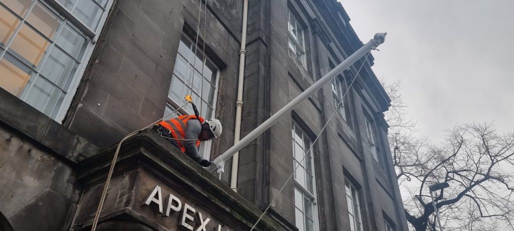 hotel building maintenance using rope access team
