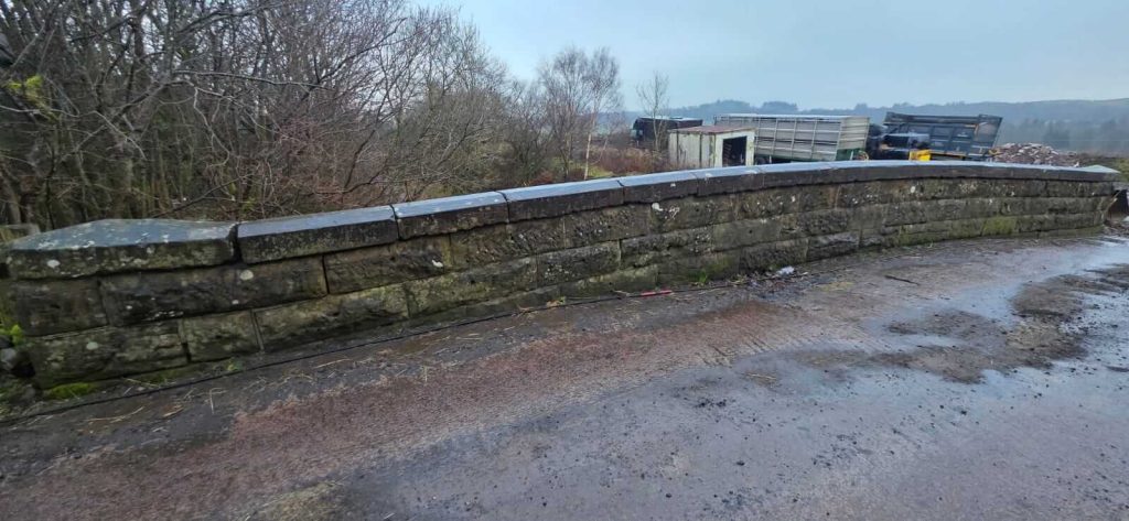 a photo of the bridge before we used DOFF Cleaning to remove the moss and algae